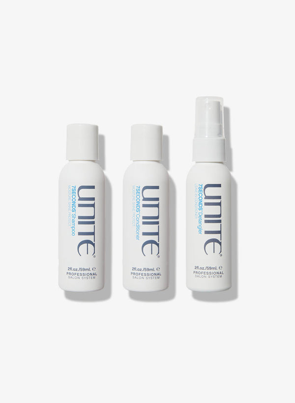 Travel-size bottles of UNITE 7SECONDS shampoo, conditioner, and detangler.