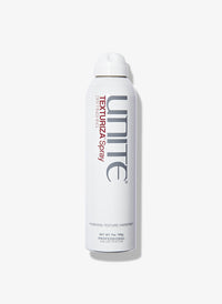 Bottle of texturizing spray hair product for professional salon finishing.